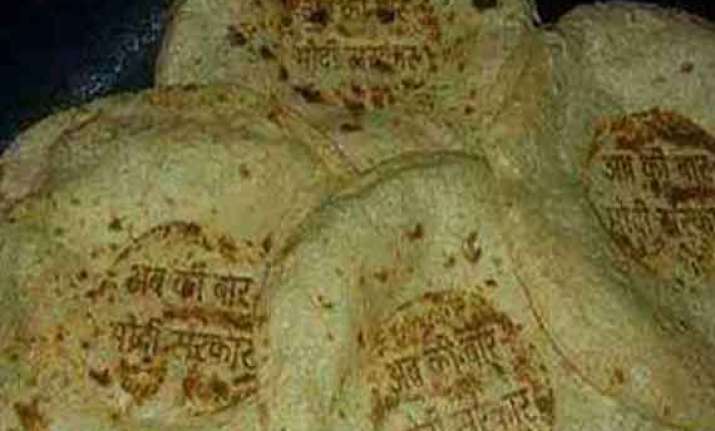 bjp supporters imprint namo mark on rotis laddoos