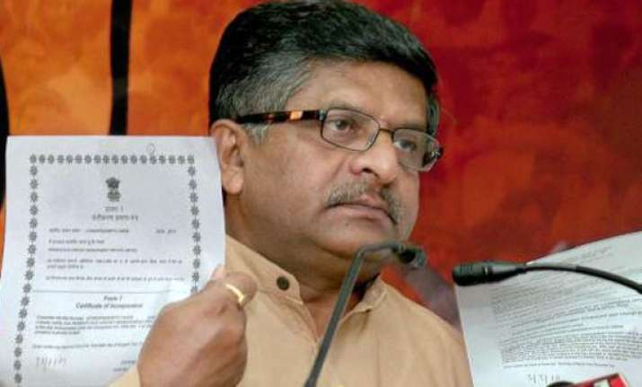 bjp blames pm s conspiracy of silence for graft
