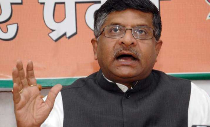 bjp flays rahul s criticism of advani