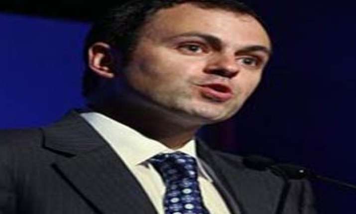 bjp targets omar government over land grabbing