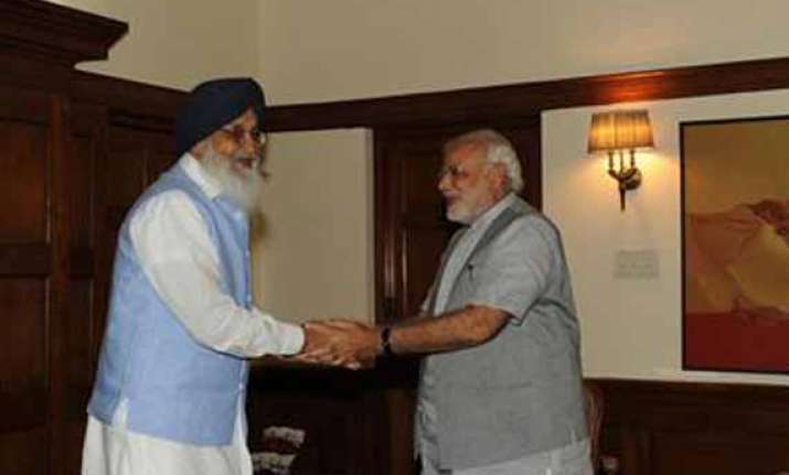 1984 riots punjab cm meets narendra modi demands probe into
