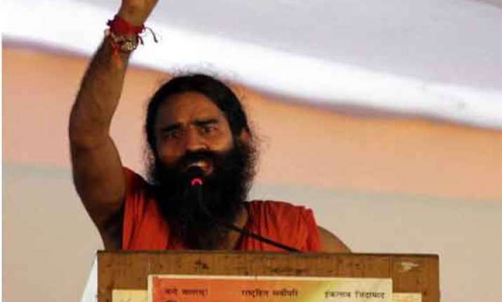 bihar minister slaps ramdev with case