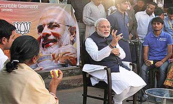 congress attacks modi over black money in gujarat