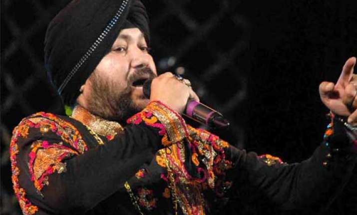 delhi polls congress woos voters with daler mehndi song