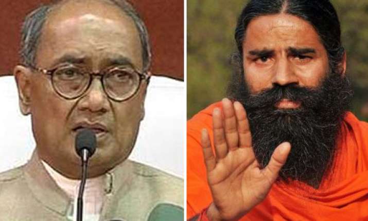 digvijay asks ramdev to declare his black money