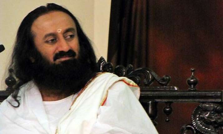dismayed over crackdown on ramdev sri sri ravishankar