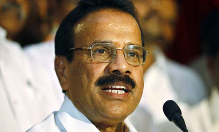 gowda camp hits back two ministers to resign