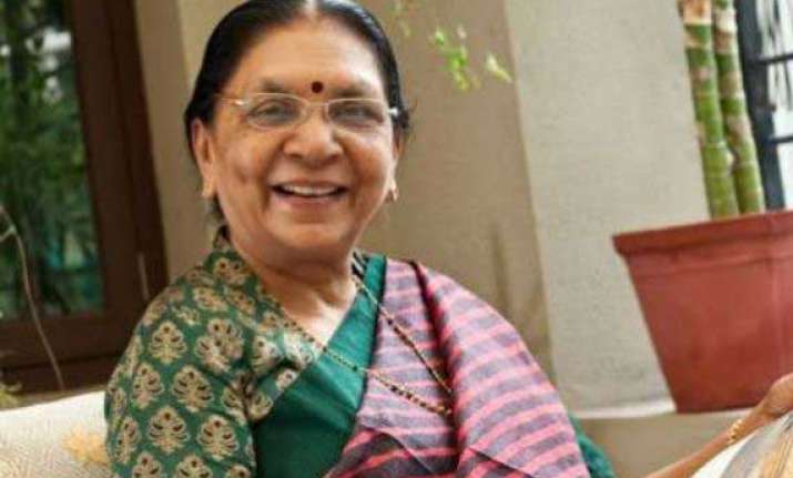 gujarat cm calls on rss chief bhagwat