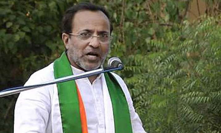gujarat cong chief arjun modhwadia defeated ahmed patel