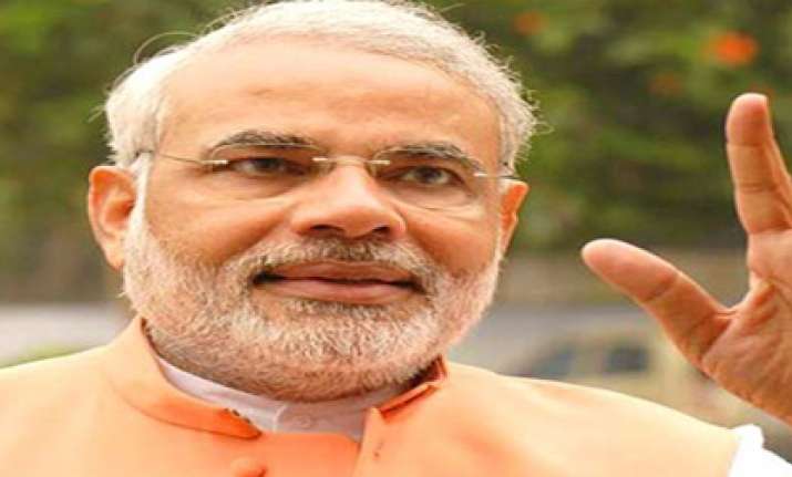 gujarat polls modi dares sonia to name cong cm candidate