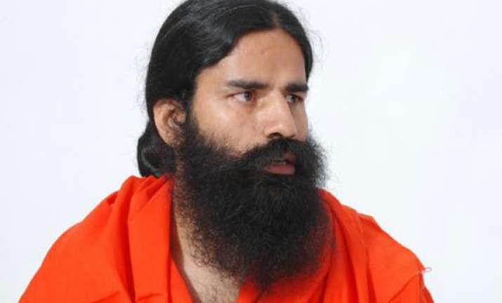 hp govt revokes land lease of swami ramdev