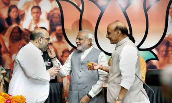 in pics amit shah takes over as bjp president