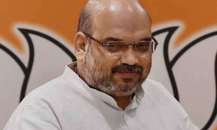 don t take delhi polls lightly amit shah to party workers