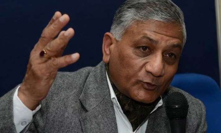 dog remark bjp stands by v k singh opp demands his ouster