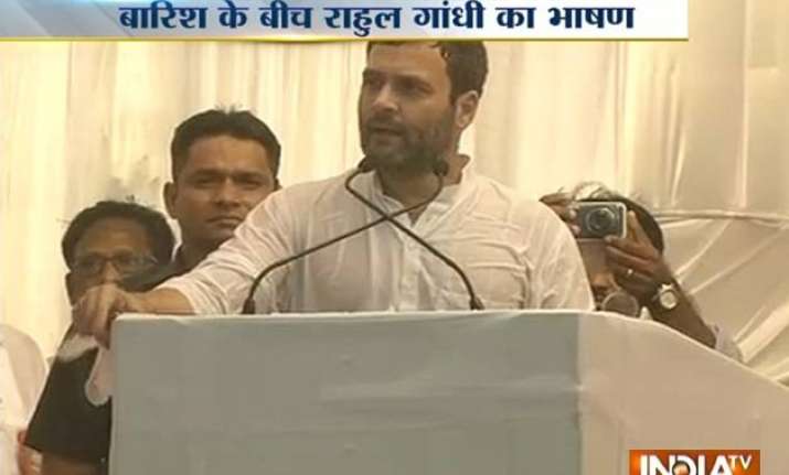 rahul gandhi targets pm modi in a rain hit rally