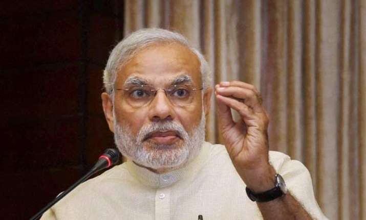 on hiroshima bombing day pm modi pitches for violence free