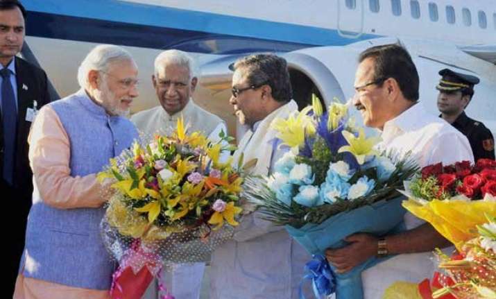 security scare as man runs parallel to pm modi s convoy