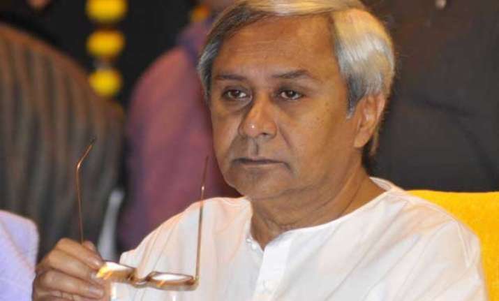 naveen patnaik outsmarts centre on mines auction issue