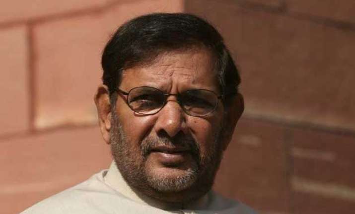 jd u to back rld candidates in up by polls sharad yadav