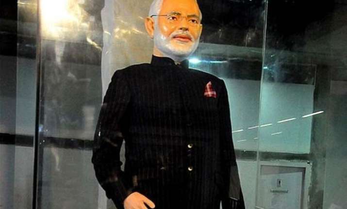 shiv sena defends modi on auction of monogrammed suit