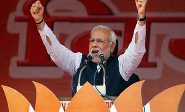 take the revenge for 15 years of misrule modi asks