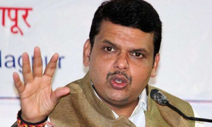 fadnavis defends bjp minister girish mahajan who carried