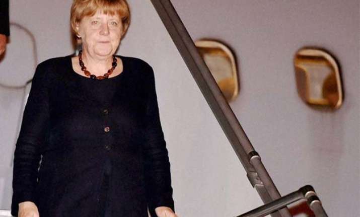 pm modi welcomes angela merkel tweets namaste chancellor
