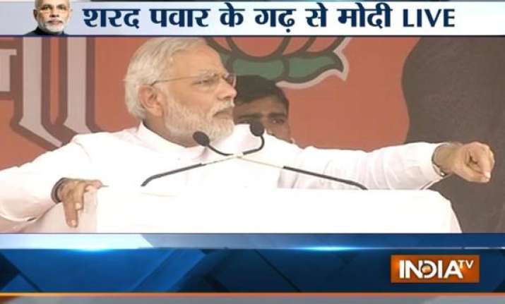 maharashtra polls throw ncp out modi tells voters in pawar