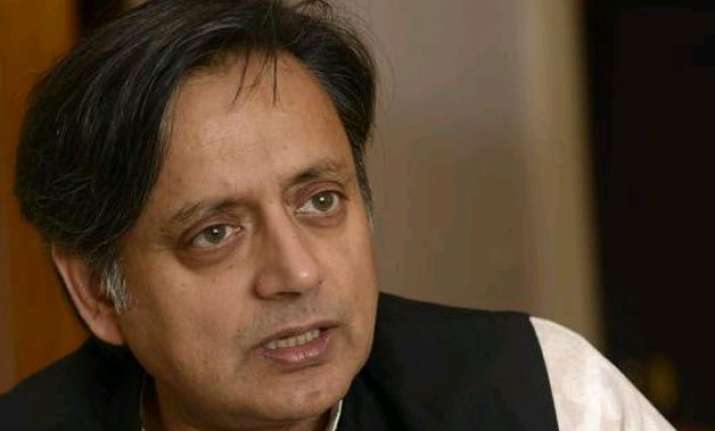 tharoor accuses modi of silence on conversion other issues