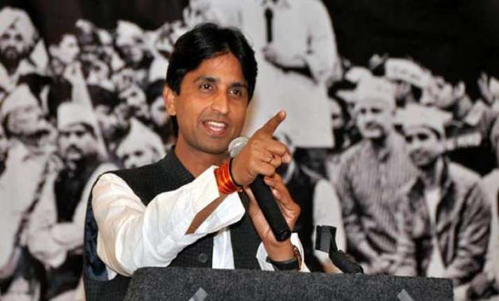 aap threatens legal action against bjp hits out at police