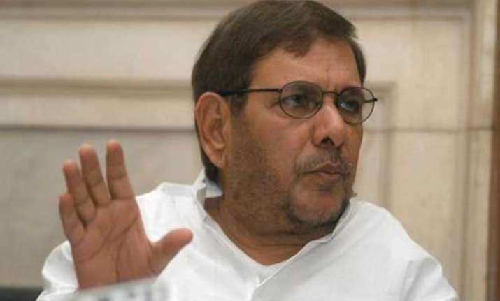 sharad calls manjhi at nitish s house to sort out