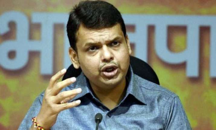 after gadkari cm fadnavis accused of riding without helmet