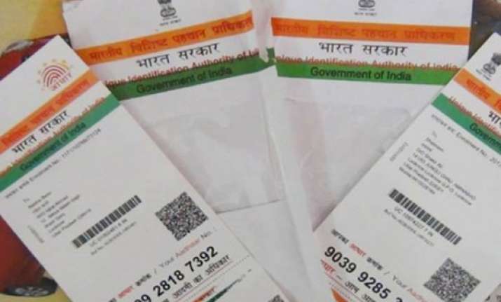 mha reverses stand on aadhaar lends full support