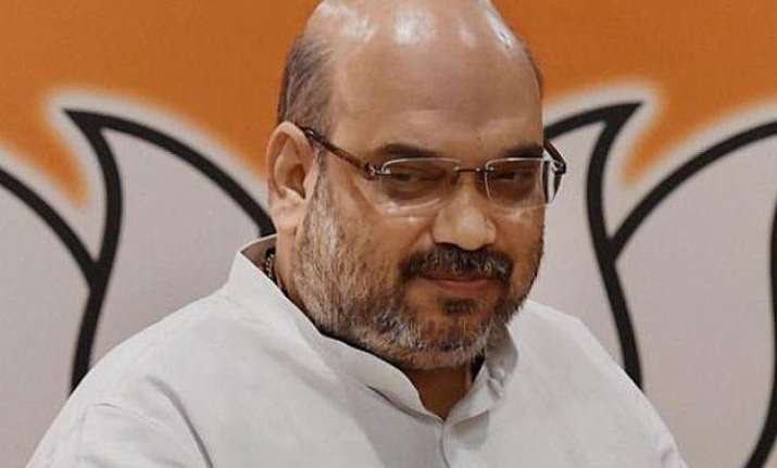 modi s a non corrupt govt says amit shah asks cong to name