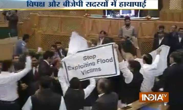 ruckus in jammu and kashmir assembly over relief to flood