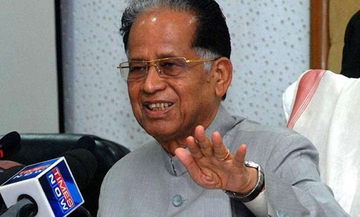 tarun gogoi opposes move to scrap plan panel