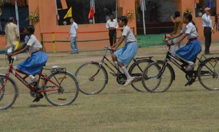 free tablets for students bicycles for scheduled castes