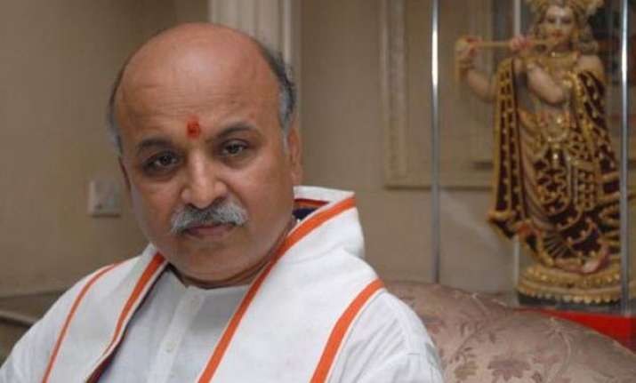 praveen togadia demands re arrest of masarat alam