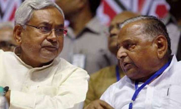 amid confusion over merger nitish asks mulayam to call meet