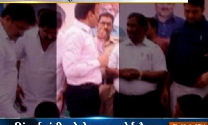 maharashtra bjp minister addresses kids with revolver