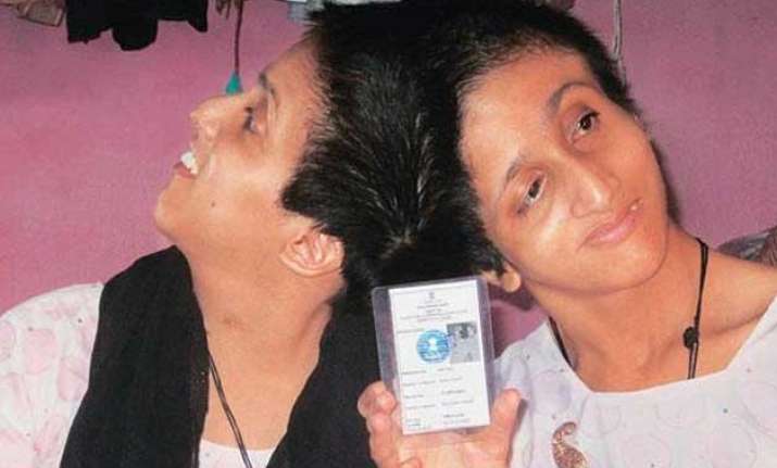 bihar polls conjoined twins farah and saba vote on a single