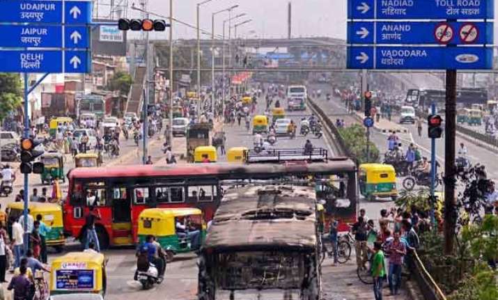 patel row congress accuses cops of atrocities wants cm to