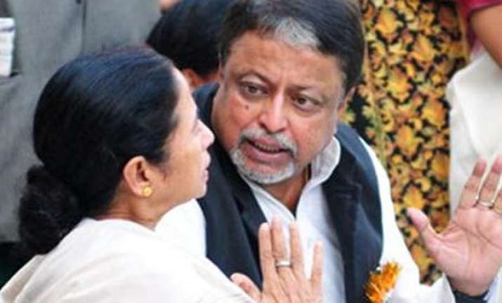 mamata banerjee accuses bjp of harassing her confidante