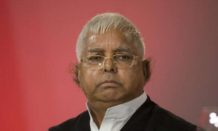 not attending sonia s iftaar for raj bhawan march lalu