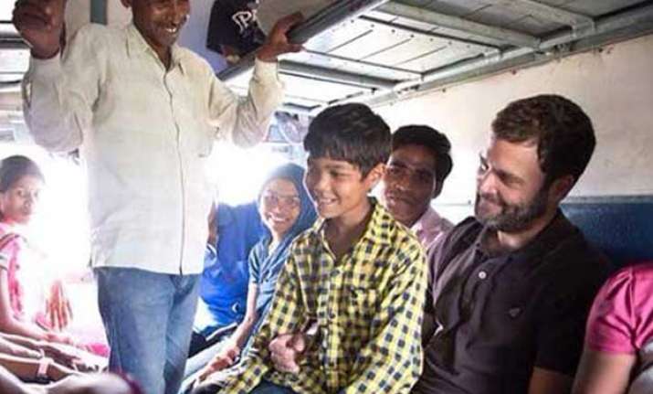 rahul gandhi travels in general coach of train to meet