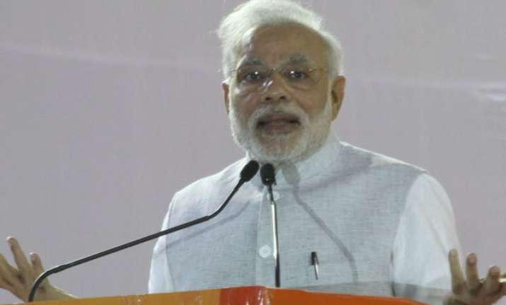 pm modi announces higher aid for rain affected farmers