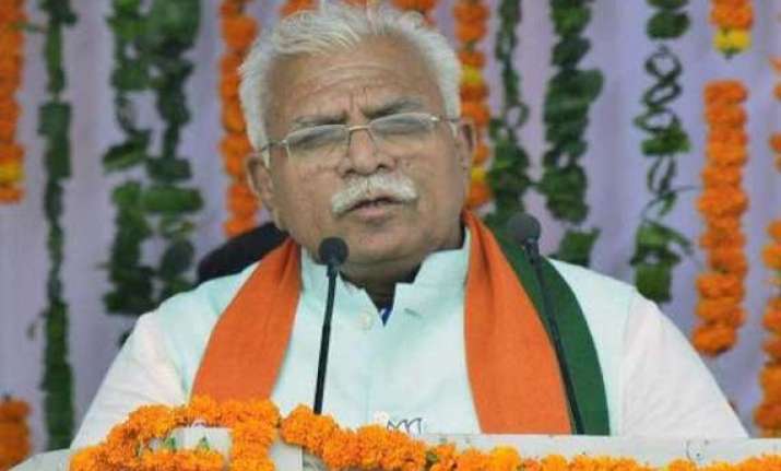 pm congratulates khattar on taking oath as haryana cm