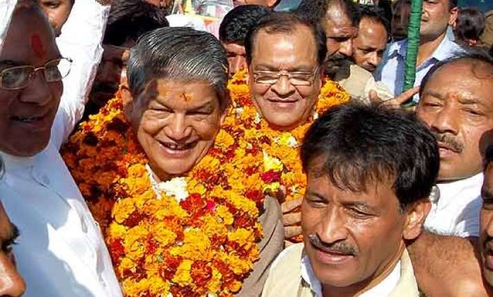oppositionbjp slams u khand cm for frequent visits to delhi
