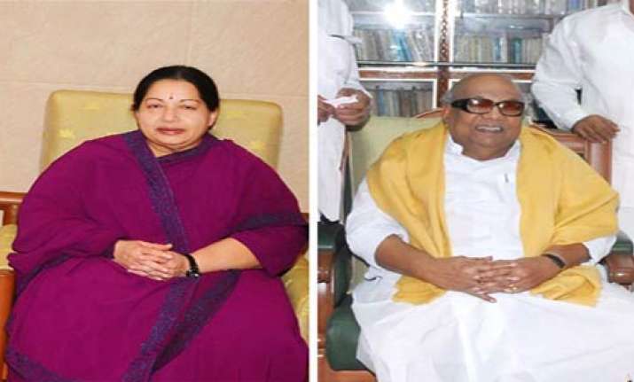 karunanidhi jayalalithaa keep fingers crossed