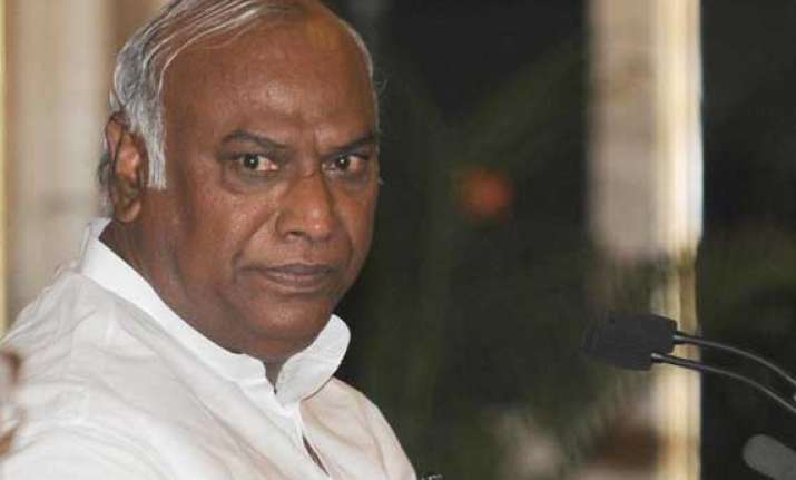 kharge questions sudden hike in rail fares